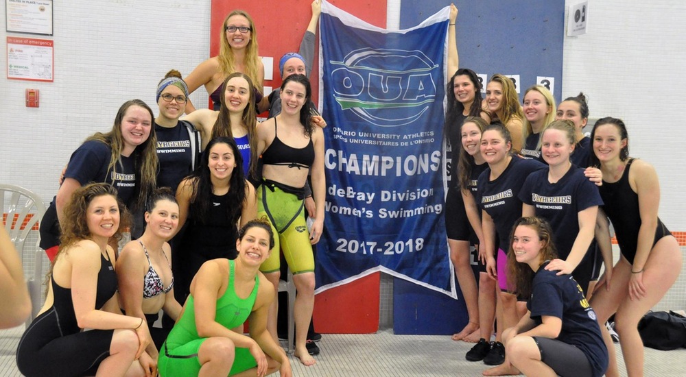 SWIM | Voyageurs Women Win 4th Consecutive Divisional Title, Men 2nd