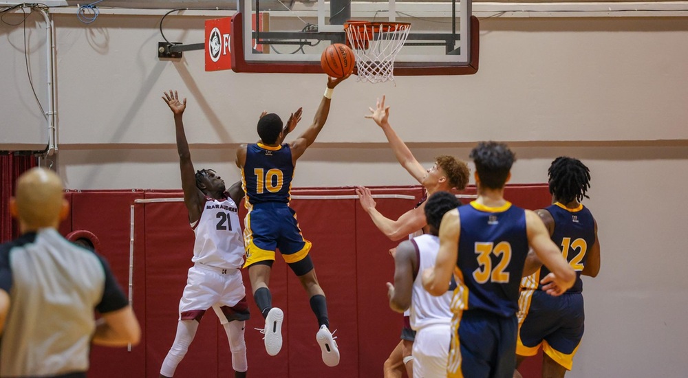Dia Hantchi goes up for a layup - Kevin Lassel