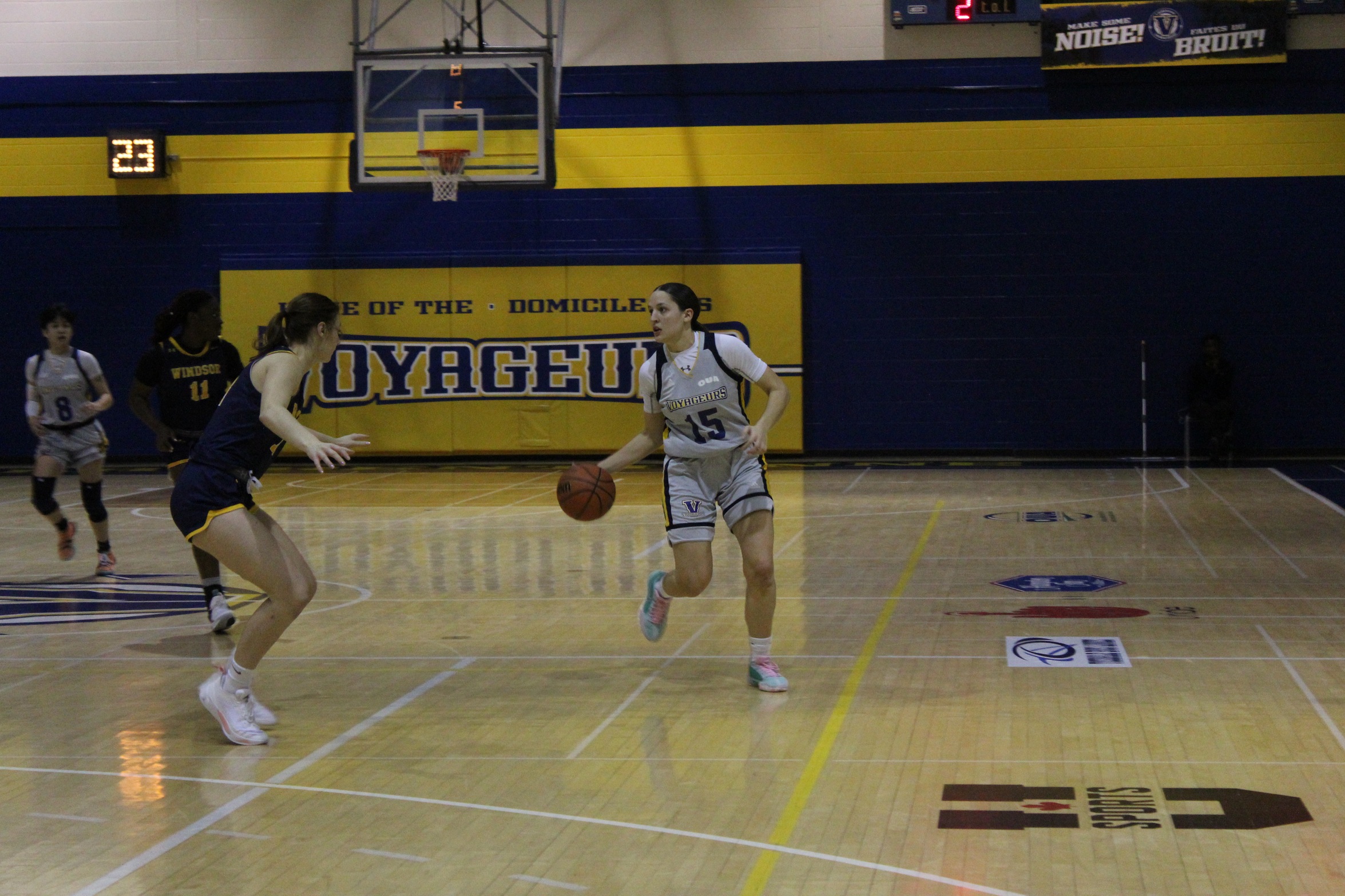 Molly Adams moving the ball up the court - Sarah Makcrow