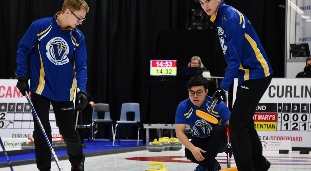 Derek delivers a stone - Curling Canada/Duncan Bell